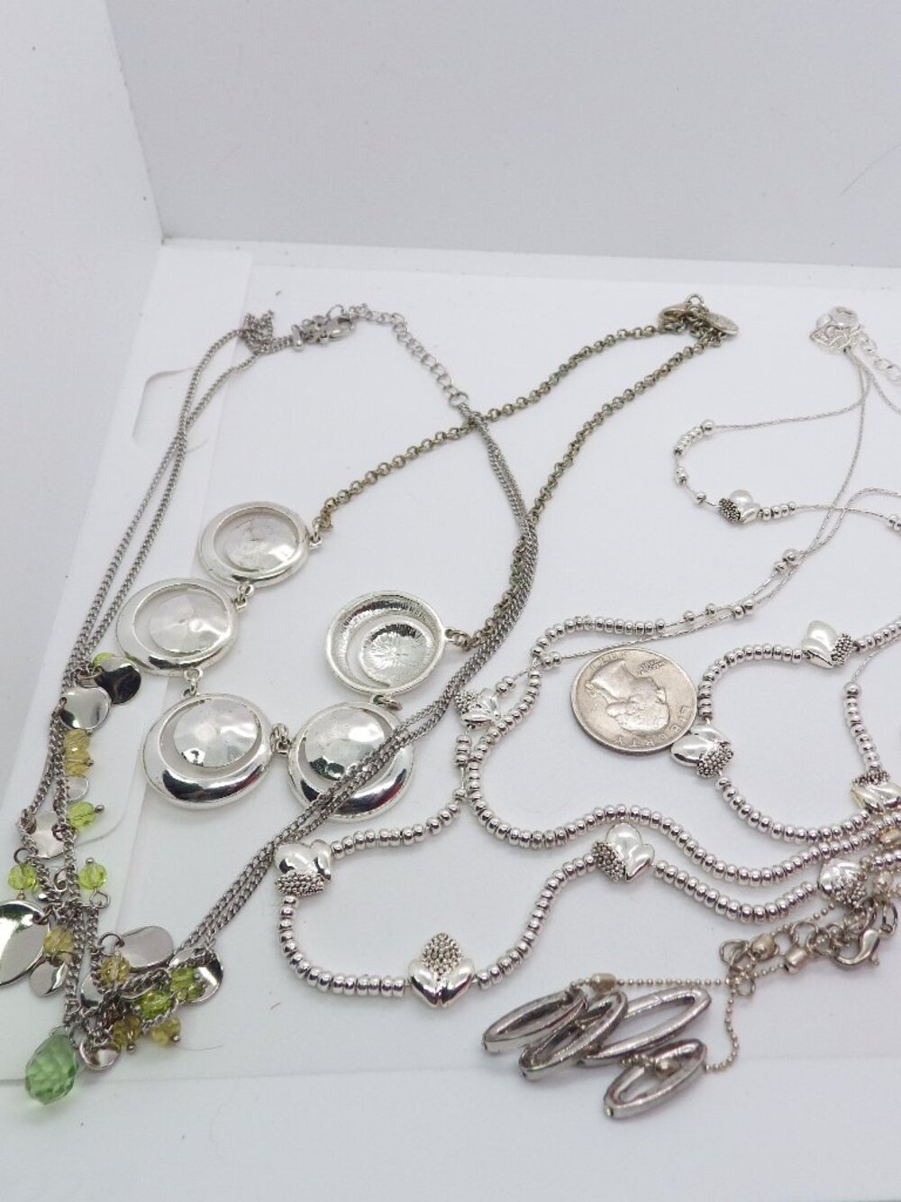 Lot of 4 Silver tone necklaces 801G2